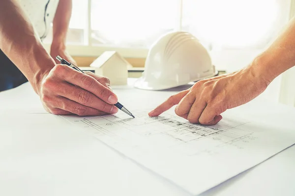 Hands of Engineer working on blueprint Construction concept. Engineering tools. Vintage tone. — Stock Photo, Image