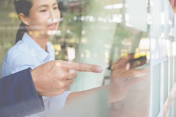 Business concept. Business people discussing the charts and graphs showing the results of their successful teamwork. — Stock Photo, Image