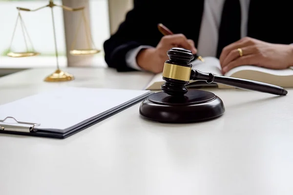 Judge gavel with Justice lawyers having team meeting at law firm — Stock Photo, Image