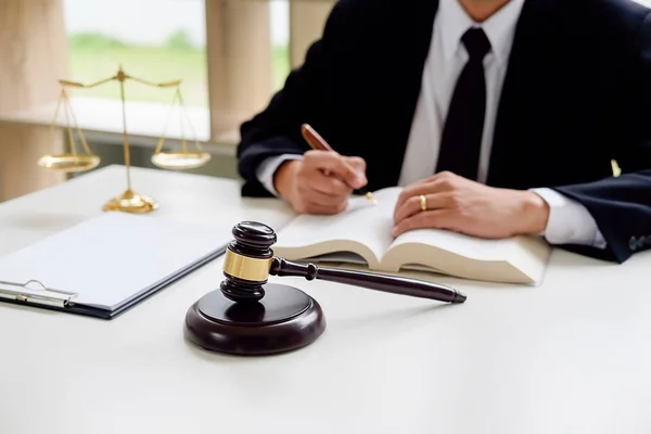 Judge gavel with Justice lawyers having team meeting at law firm — Stock Photo, Image