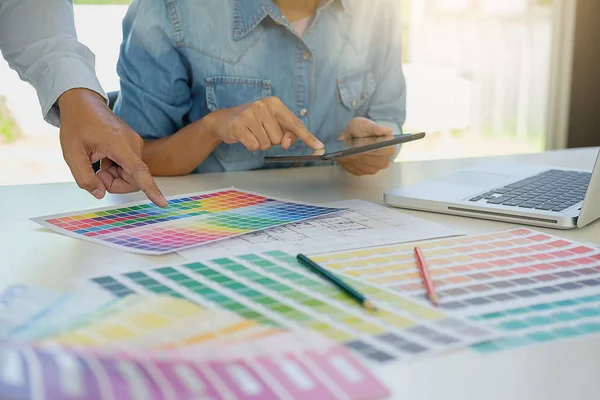 Graphic design and color swatches and pens on a desk. Architectu — Stock Photo, Image