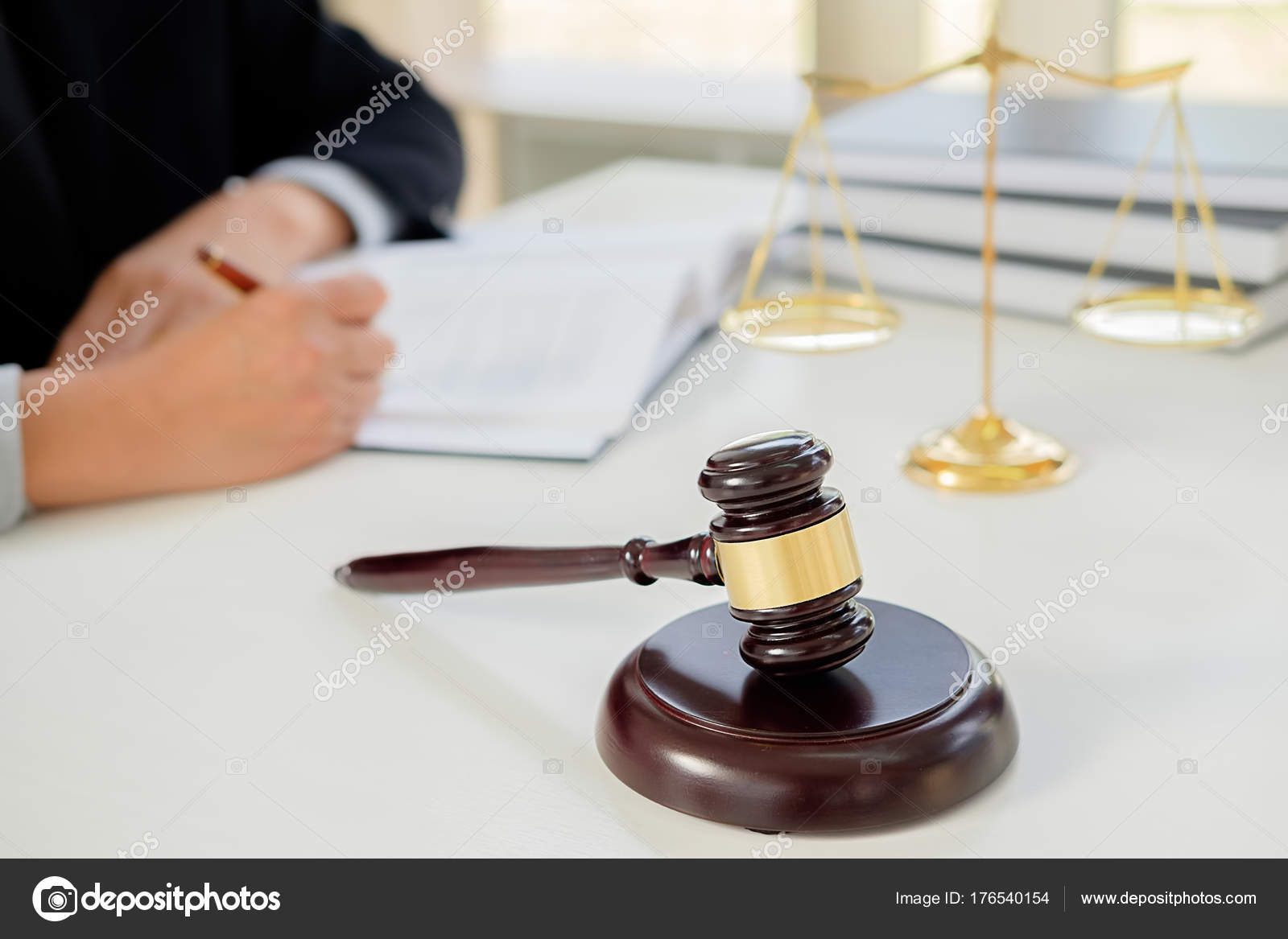 Judge gavel with Justice lawyers having team meeting at law fir Stock