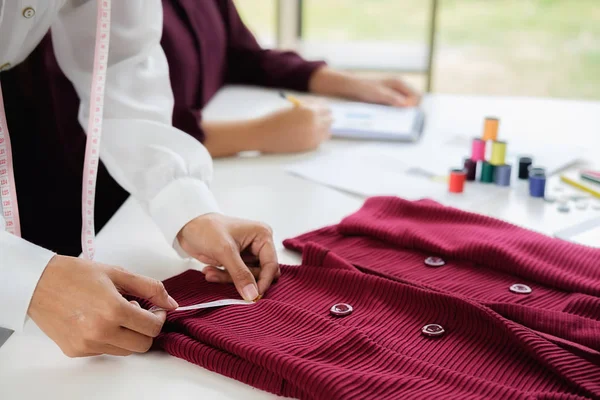 Attractive young woman fashion designer standing and working in — Stock Photo, Image