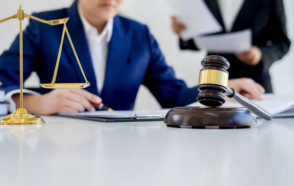 Judge gavel with Justice lawyers having team meeting at law firm — Stock Photo, Image