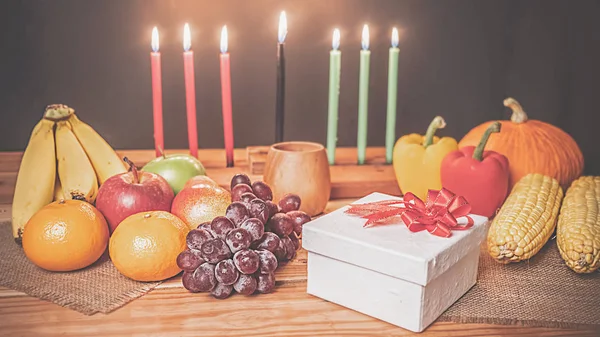 Kwanzaa holiday concept with decorate seven candles red, black a — Stock Photo, Image