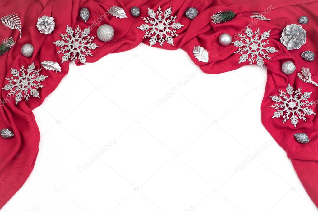Decorative festive background of Red drape Silver snowflakes.