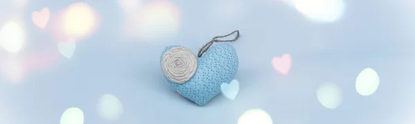 Banner Romantic heart on a blue background.