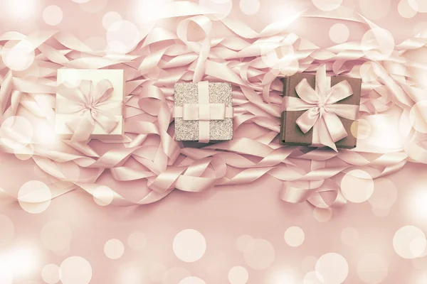Boxes with gifts on a festive background. Decorative Textured background top View