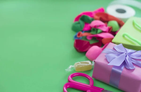 Festive composition set of gift boxes with balls candy cocktail materials.