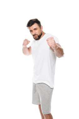 Muscular man ready to fight  clipart