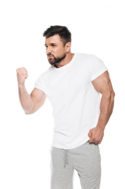 Muscular man ready to fight  clipart