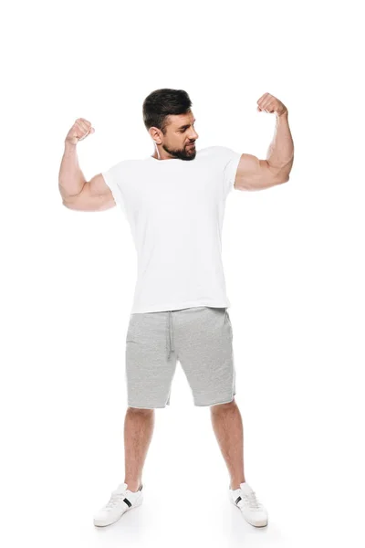 Man visar hans biceps — Stockfoto