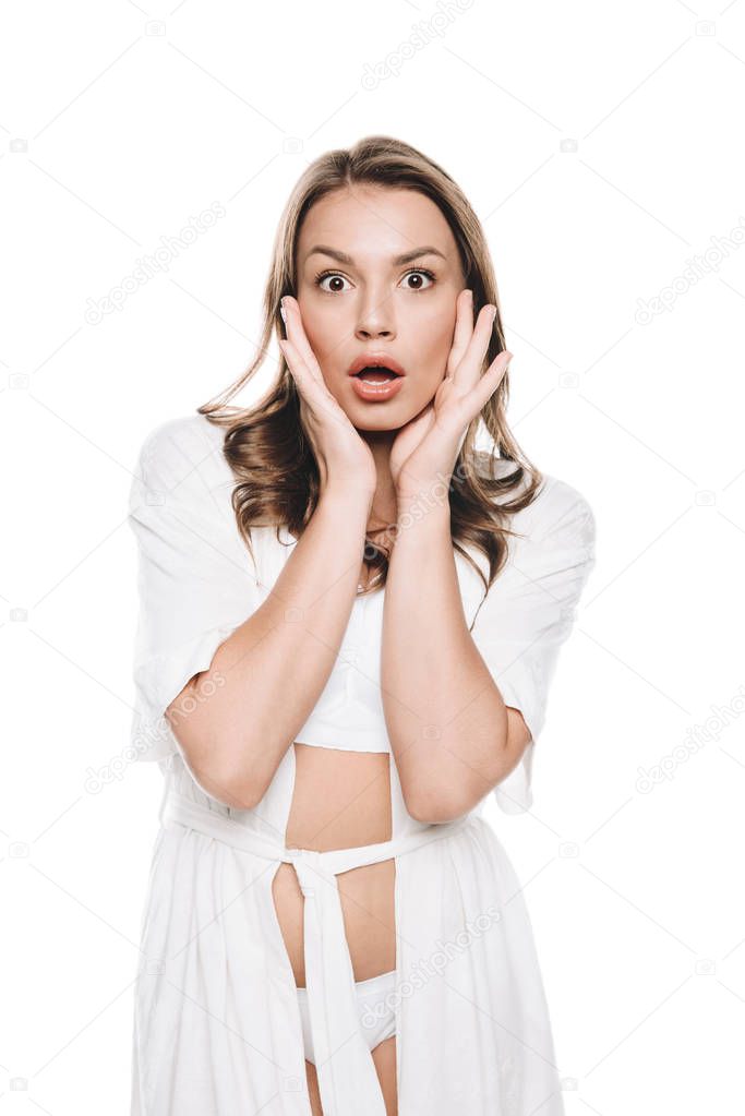 woman in housecoat with shocked expression