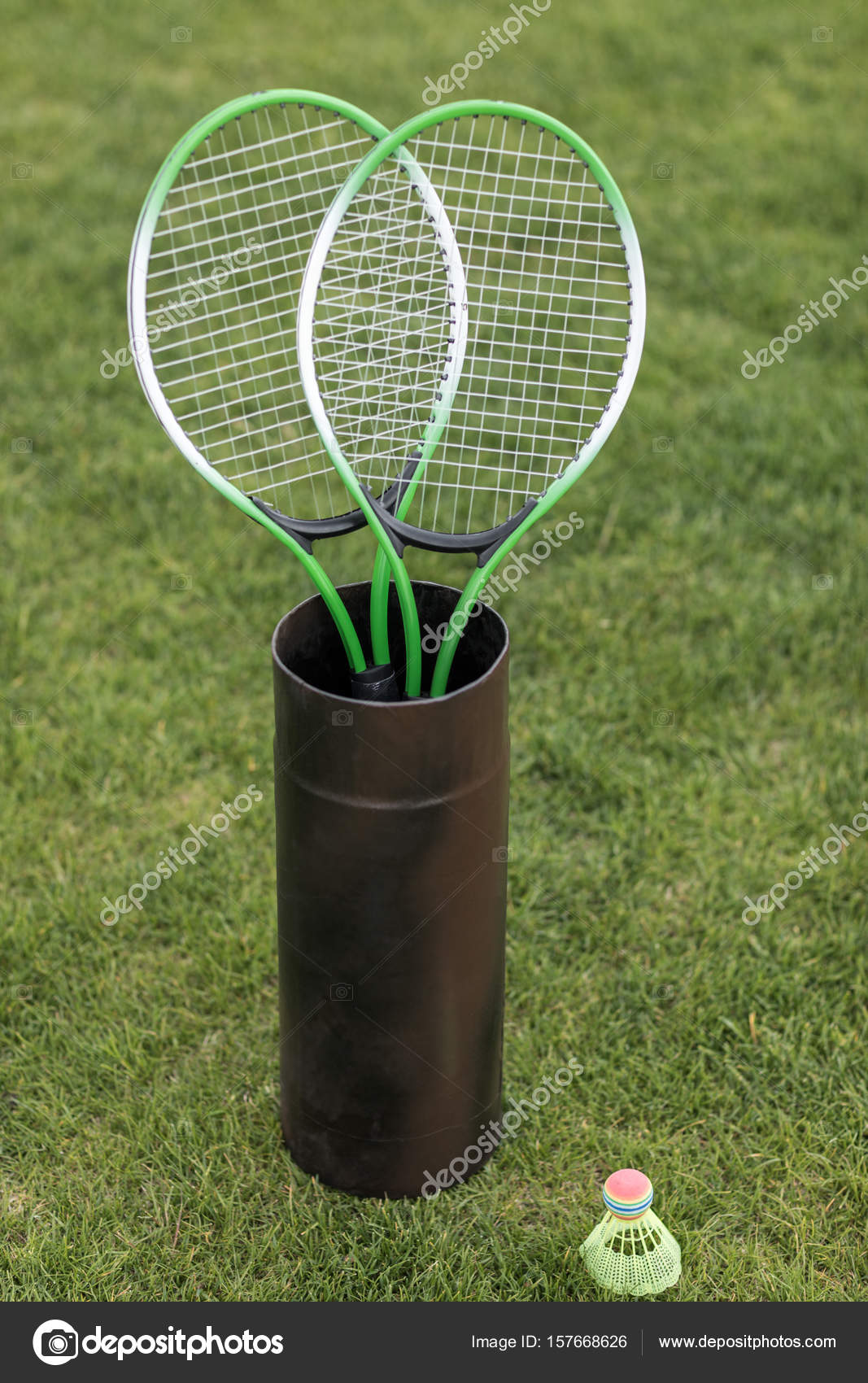 Badminton racquets in container — Free Stock Photo © IgorVetushko