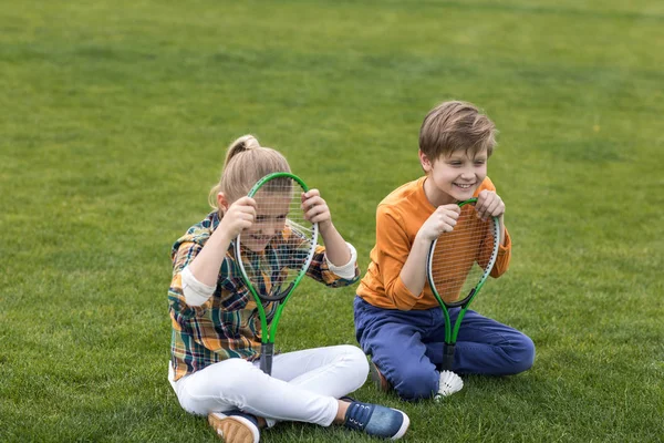 Little kids with badminton equipment — Stock Photo, Image