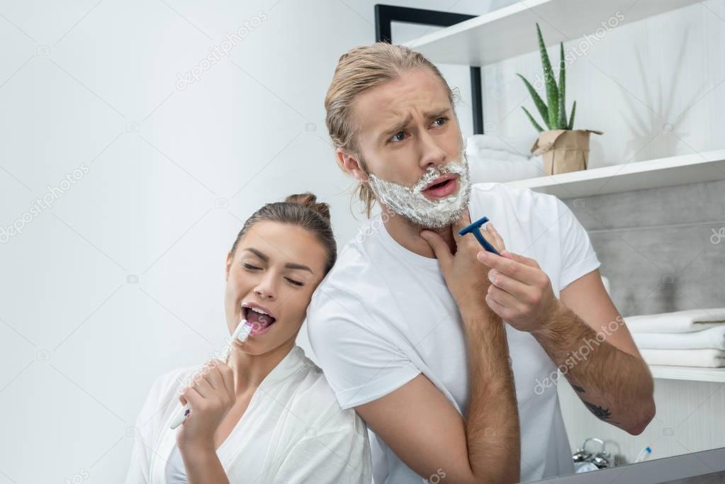Couple doing morning routine 
