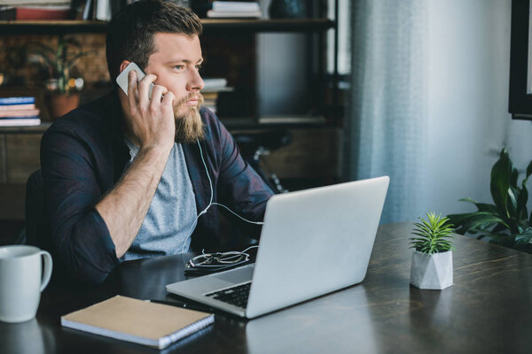 businessman talking on smartphone