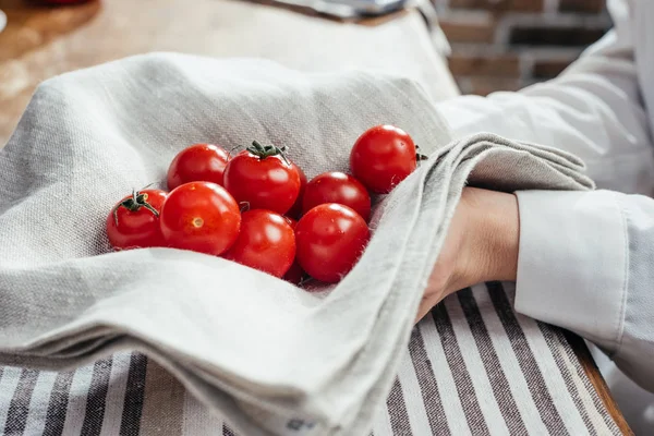 Cherry tomatoes in napkin — Stock Photo, Image