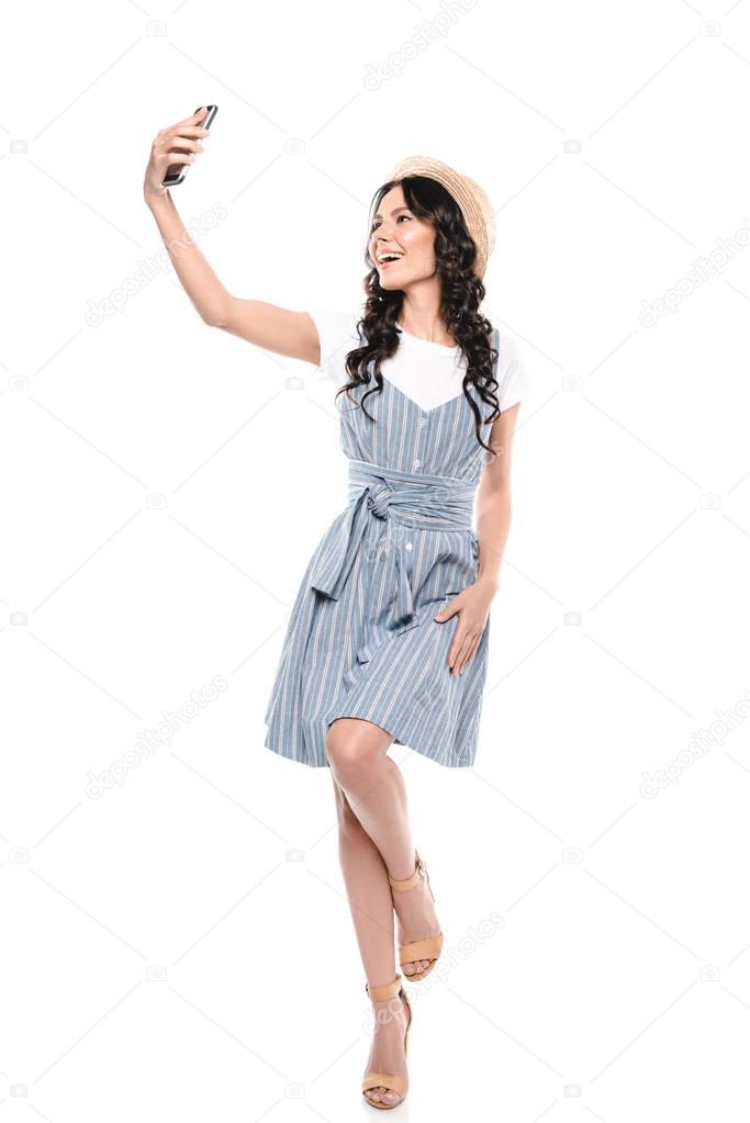 Woman taking selfie on smartphone 