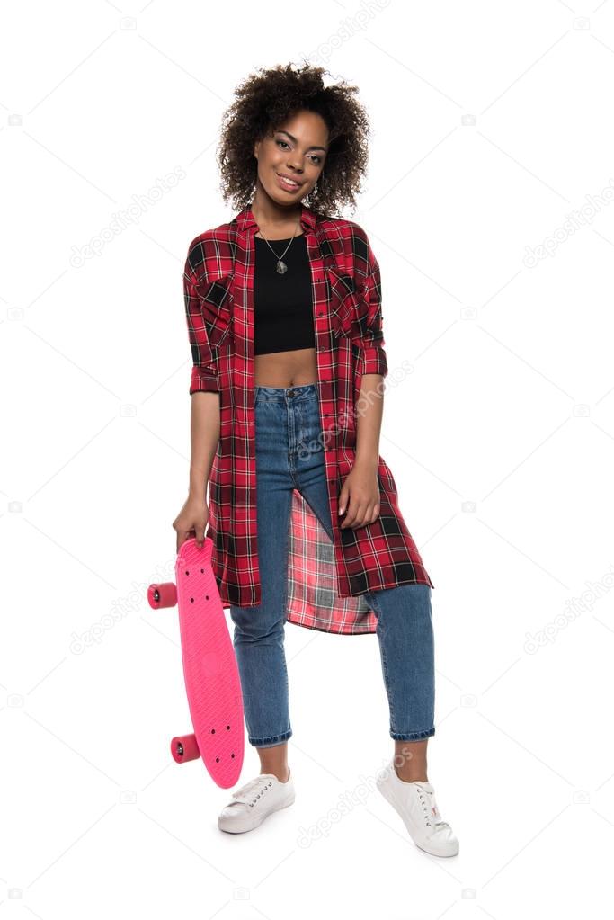 African american woman with skateboard 