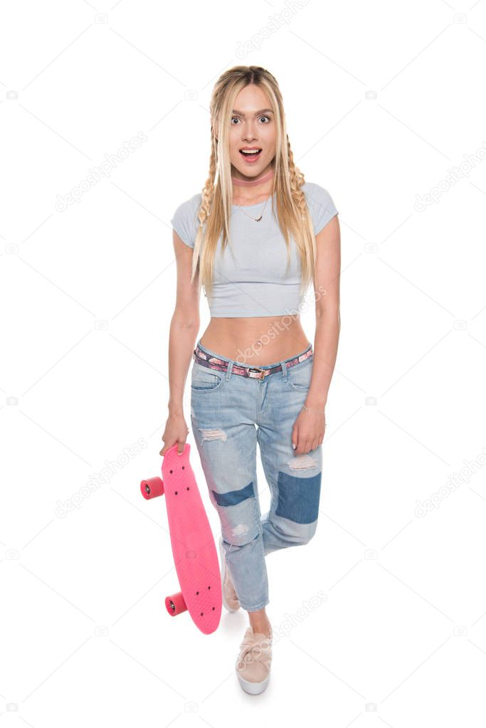 Young woman with skateboard 