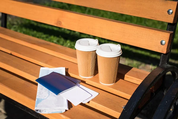 Passports with tickets and paper cups — Stock Photo, Image