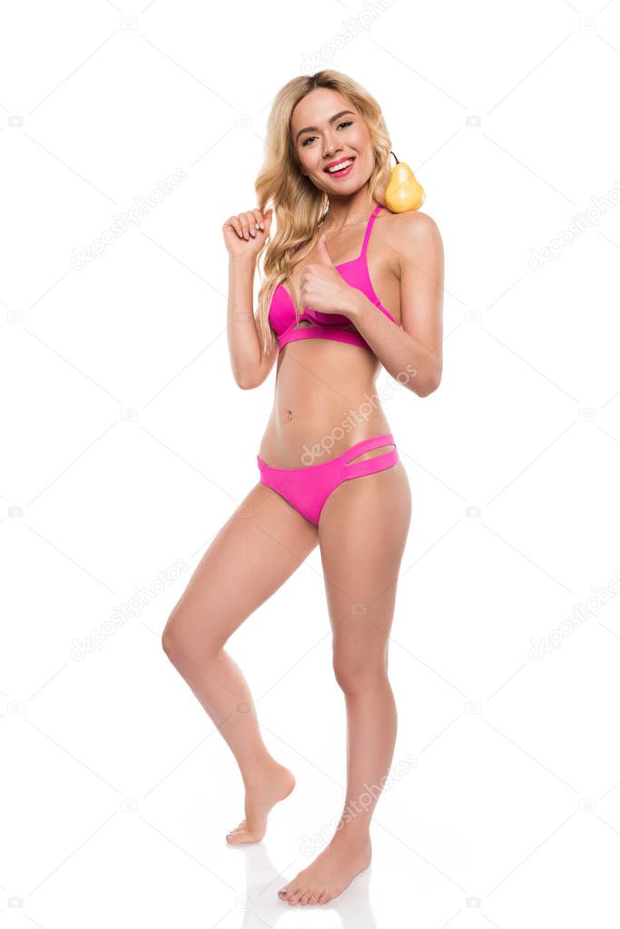 woman in swimsuit with pear  