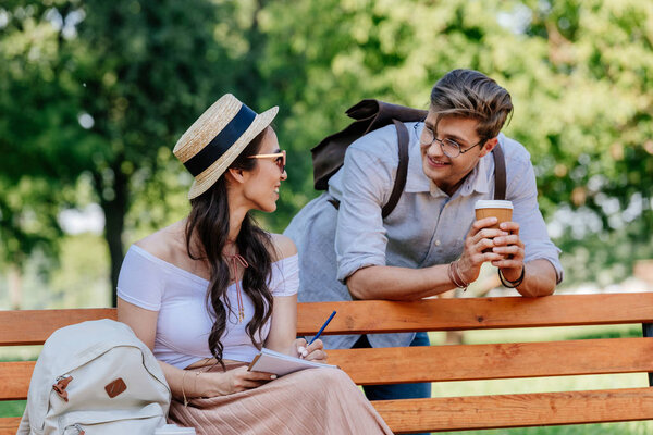 multicultural couple in park