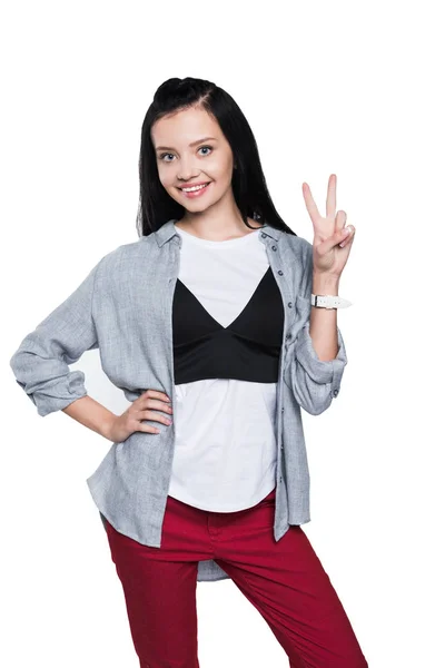 Girl showing victory sign — Free Stock Photo