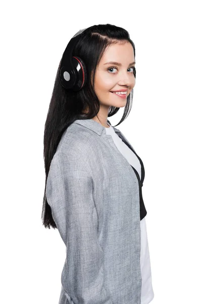 Chica sonriente en auriculares — Foto de stock gratuita