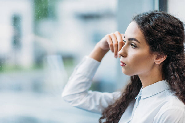 pensive brunette businesswoman