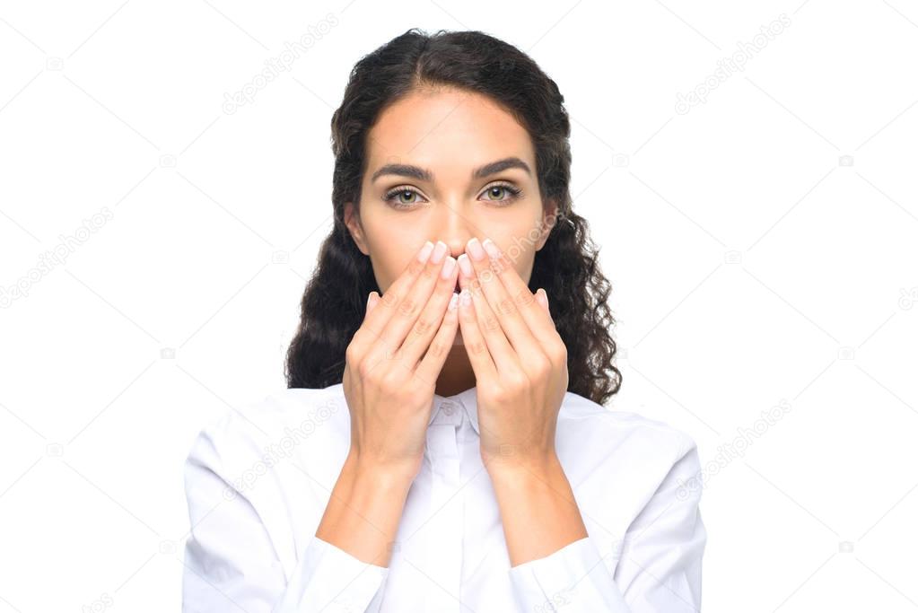 businesswoman closing ears with hands