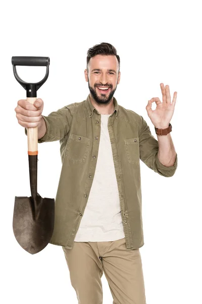 Smiling man with shovel — Stock Photo, Image