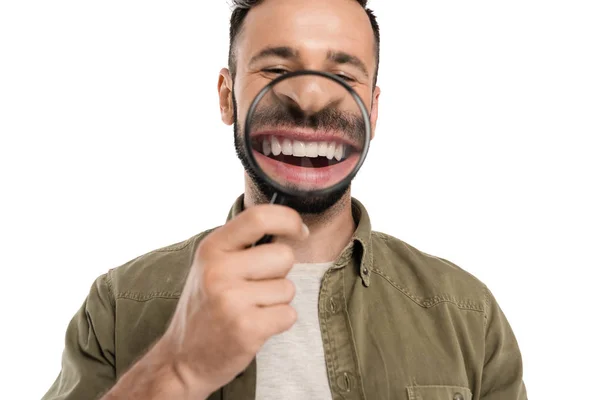 Man holding magnifying glass — Stock Photo, Image