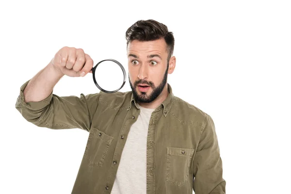 Man holding magnifying glass — Stock Photo, Image