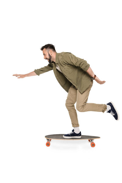 man riding longboard