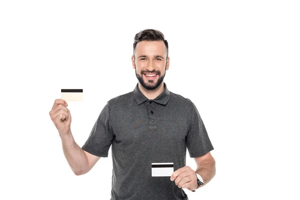 Hombre mostrando tarjetas de crédito — Foto de Stock