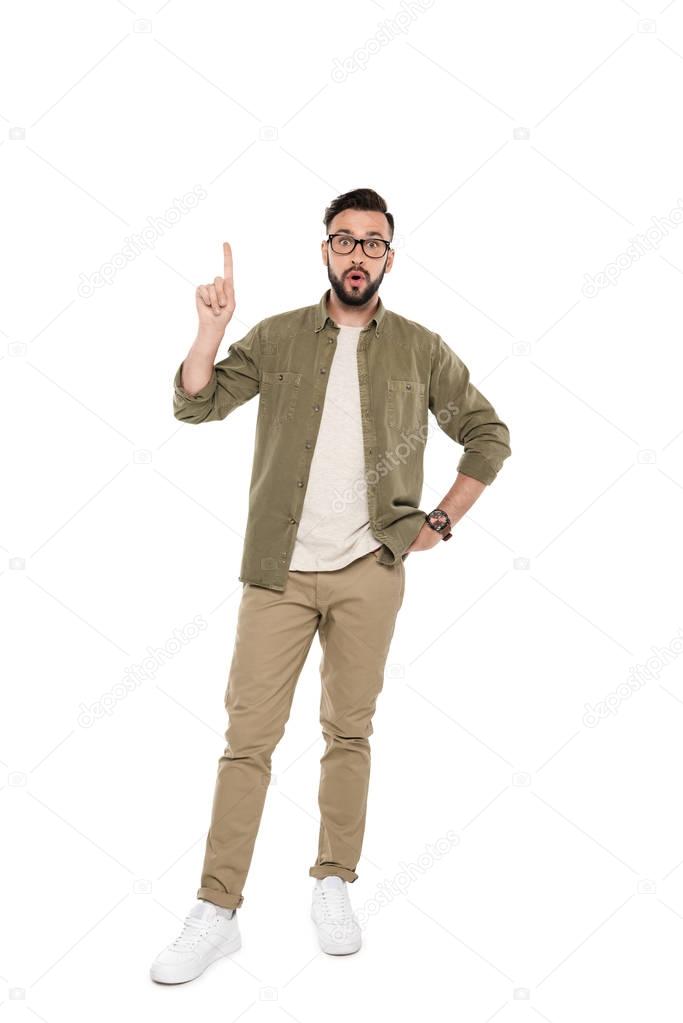 man pointing up with finger