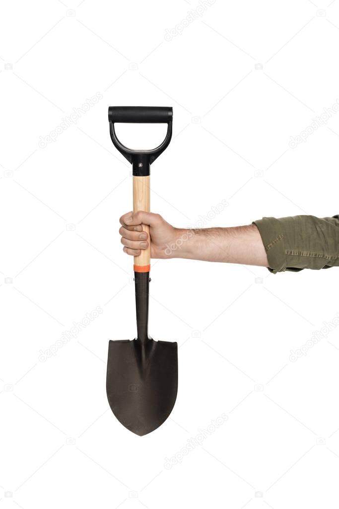 man holding shovel