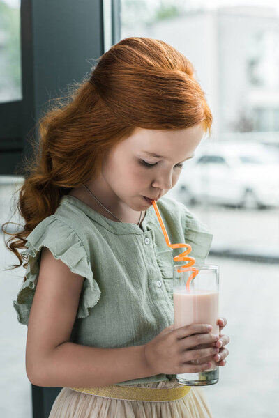 girl drinking milkshake