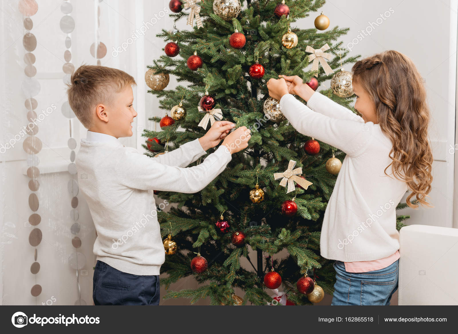Kids Decorating Christmas Tree Stock Photo By IgorVetushko 162865518 kids-decorating-christmas-tree-stock-photo-by-igorvetushko-162865518