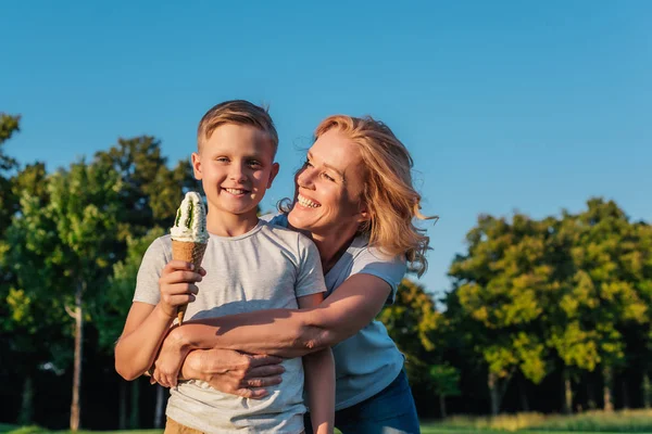 Grandmother and kid with ice cream — Stock Photo, Image