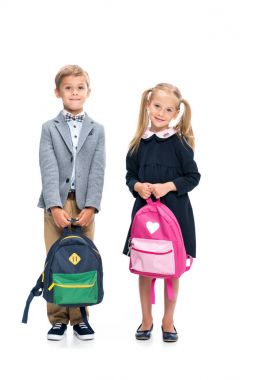 adorable pupils with backpacks