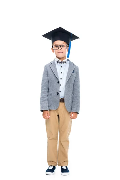 Happy schoolboy in graduation hat — Stock Photo, Image