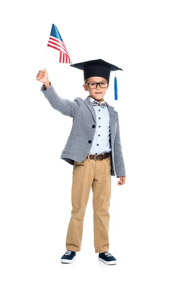 Estudante com bandeira dos EUA e chapéu de formatura — Fotografia de Stock