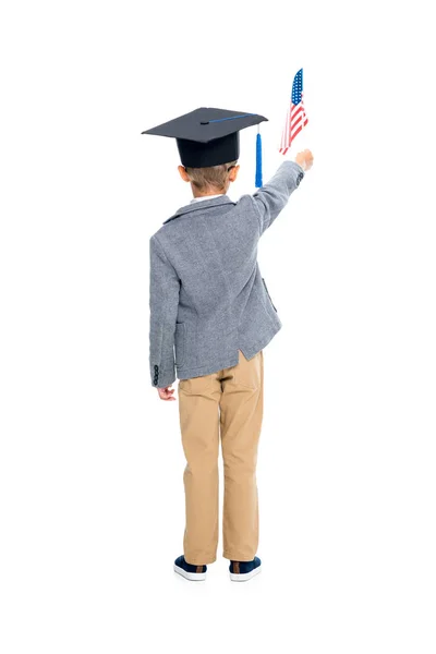 Schoolboy with usa flag and graduation hat — Stock Photo, Image