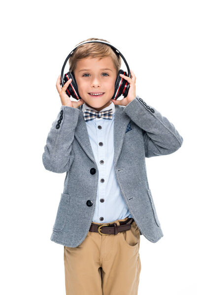 schoolboy in wireless headphones
