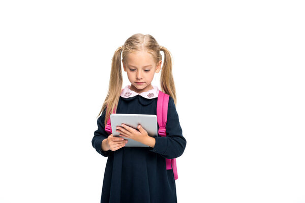 schoolgirl using digital tablet