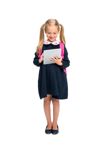schoolgirl using digital tablet