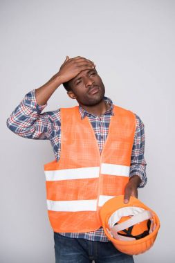 construction worker wiping sweat   clipart